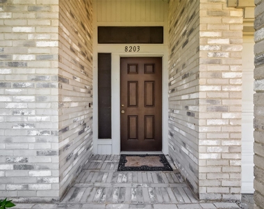 8203 Paddington Place Drive - Photo Thumbnail 2