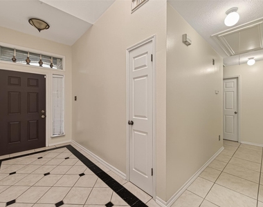 8203 Paddington Place Drive - Photo Thumbnail 3