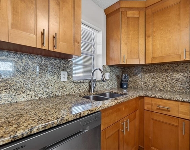 7625 Sun Island Drive S - Photo Thumbnail 6