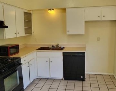 7326 Harold Walker Drive - Photo Thumbnail 3