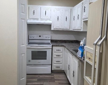 220 Nw 43rd Court - Photo Thumbnail 1