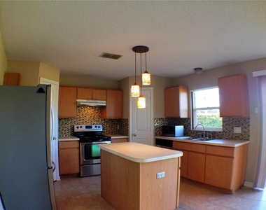 4437 Stonemeadow Drive - Photo Thumbnail 3