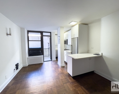 East 35 Street - Photo Thumbnail 2