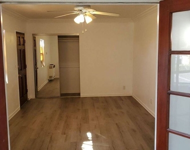 1053 S Stanley Avenue - Photo Thumbnail 2