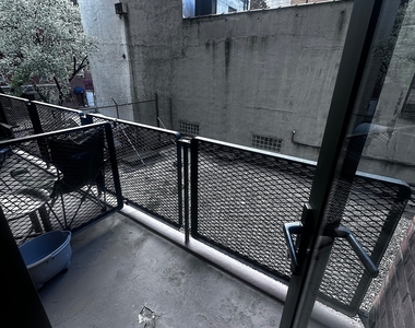 East 35 Street - Photo Thumbnail 9