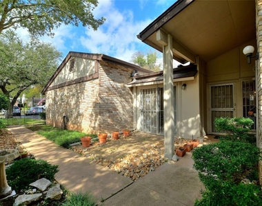 7919 Ridgeline Dr N - Photo Thumbnail 2