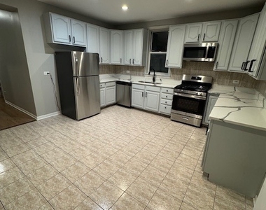 6412 S Greenwood Avenue - Photo Thumbnail 2