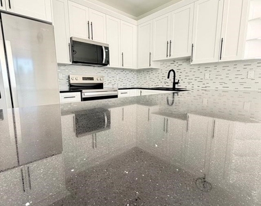 209-211 W 12th Street - Photo Thumbnail 9
