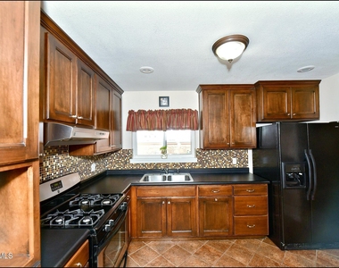 7830 Basswood Avenue - Photo Thumbnail 18