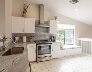 10624 Tropic Palm Avenue - Photo Thumbnail 14