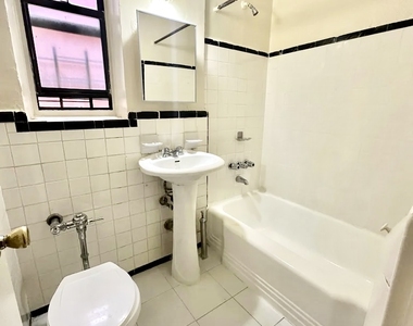 72-10 37th Avenue - Photo Thumbnail 3