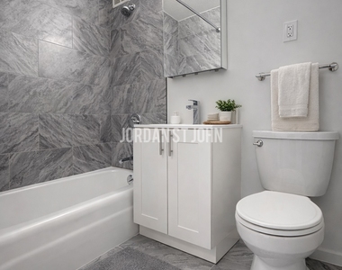 E 28TH ST - Photo Thumbnail 4
