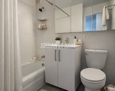 E 28TH ST - Photo Thumbnail 4