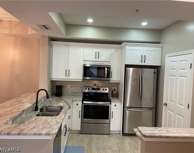 9025 Colby Drive - Photo Thumbnail 9