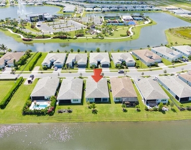 10407 Sw Aquila Way - Photo Thumbnail 2