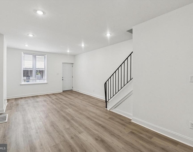 1761 N Newkirk Street - Photo Thumbnail 3