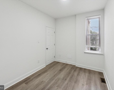 1761 N Newkirk Street - Photo Thumbnail 8