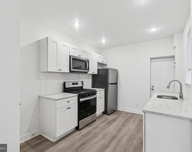 1761 N Newkirk Street - Photo Thumbnail 2