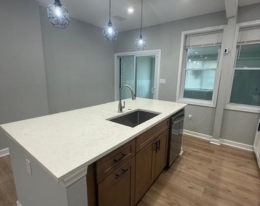 1517 Sycamore Street - Photo Thumbnail 3