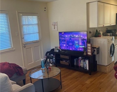 1106 W 22nd St - Photo Thumbnail 2