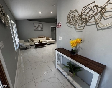 8409 Tahiti Road - Photo Thumbnail 2