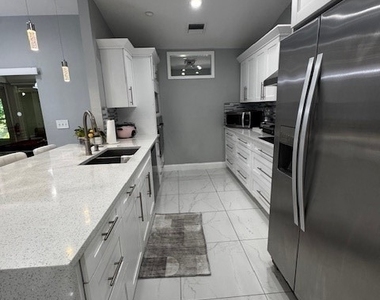 8409 Tahiti Road - Photo Thumbnail 8