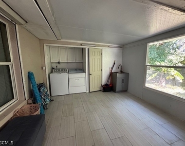 8409 Tahiti Road - Photo Thumbnail 16