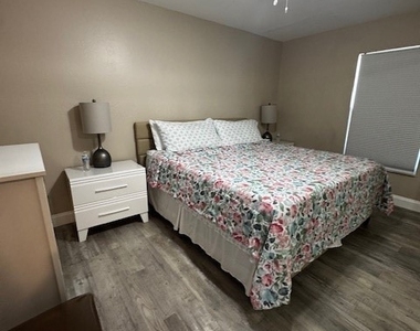 8409 Tahiti Road - Photo Thumbnail 11