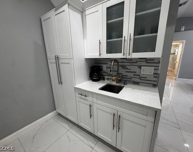 8409 Tahiti Road - Photo Thumbnail 7