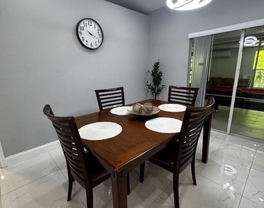 8409 Tahiti Road - Photo Thumbnail 10