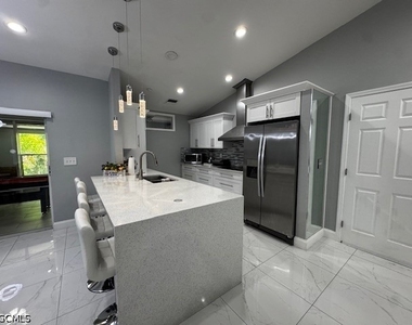 8409 Tahiti Road - Photo Thumbnail 6