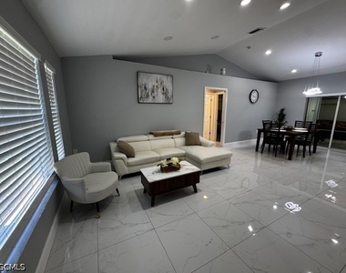 8409 Tahiti Road - Photo Thumbnail 3