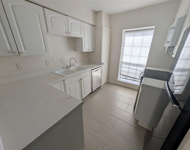 9017 Rue Cambon Street - Photo Thumbnail 2