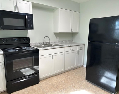 1643 Ne 16th Avenue - Photo Thumbnail 2