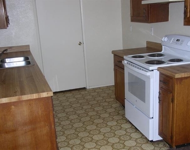 7210 Pineberry Road - Photo Thumbnail 3