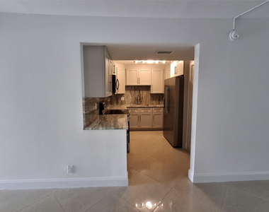 8763 Shadow Wood Boulevard - Photo Thumbnail 3