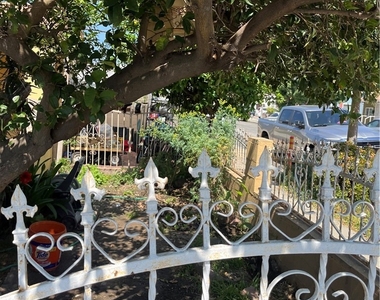 1229 E 59th - Photo Thumbnail 2