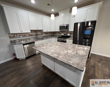 706 Greenland Square - Photo Thumbnail 1