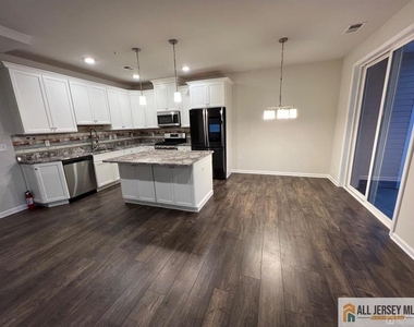 706 Greenland Square - Photo Thumbnail 2