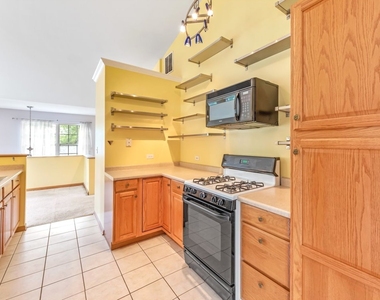 4909 Spencer Avenue - Photo Thumbnail 3