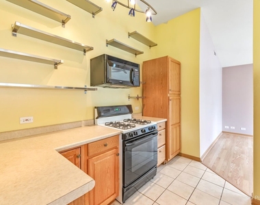 4909 Spencer Avenue - Photo Thumbnail 4