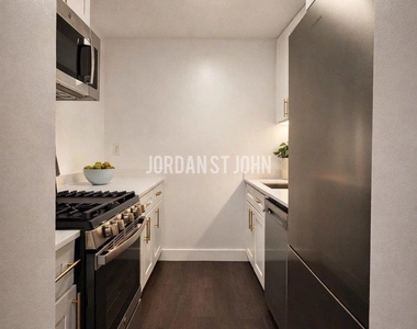 E 28TH ST - Photo Thumbnail 8