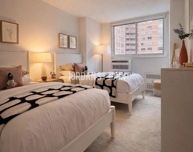E 28TH ST - Photo Thumbnail 6