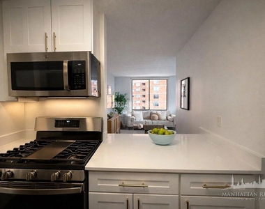 E 28TH ST - Photo Thumbnail 4