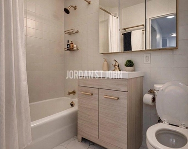 E 28TH ST - Photo Thumbnail 5
