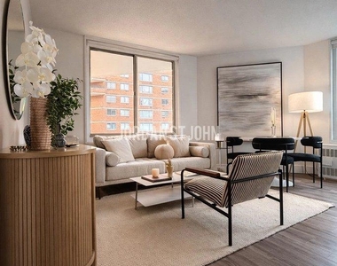 E 28TH ST - Photo Thumbnail 1