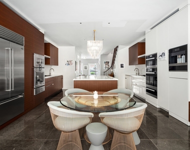 414 E 50th St - Photo Thumbnail 3