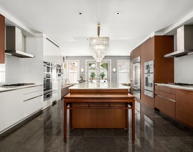 414 E 50th St - Photo Thumbnail 2