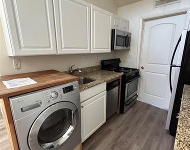 1106 W 22nd 1/2 St - Photo Thumbnail 1