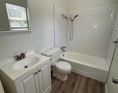 1106 W 22nd 1/2 St - Photo Thumbnail 7